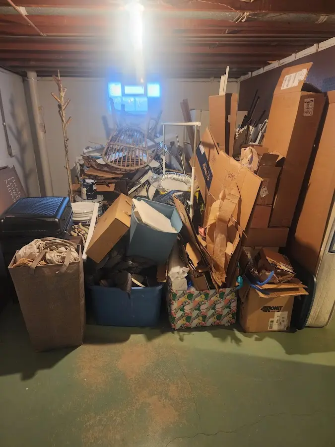 Roll-off dumpster container at job site for 20 Yard Dumpster Rental in Godfrey